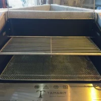 Pare-braises amovible en inox Pare-braises amovible en acier inoxydable du Fusion Grill